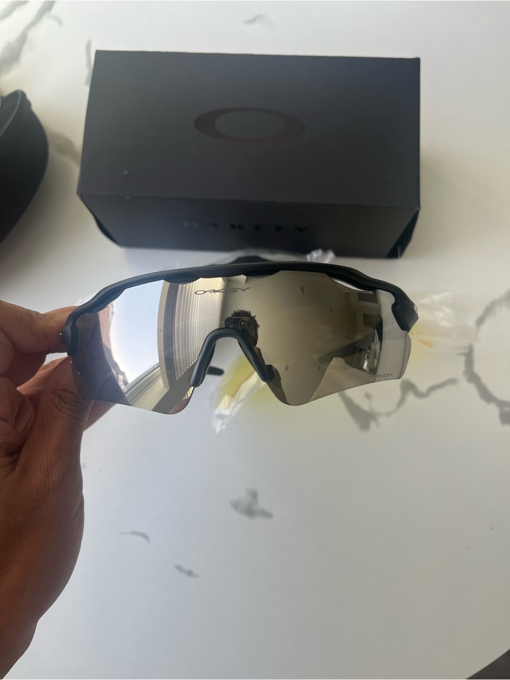 Oakley Black Frame Sunglasses with Silver Mirror Lens